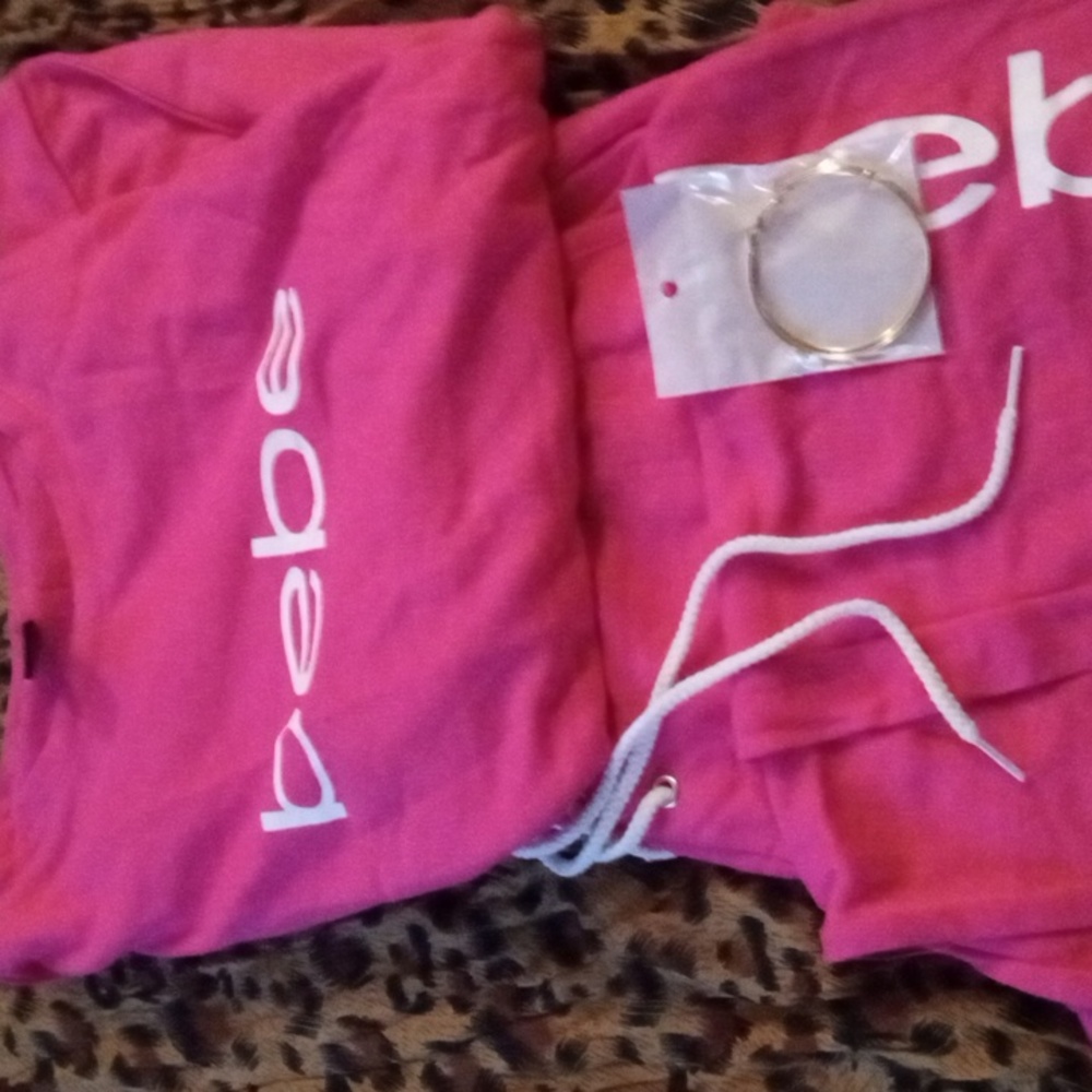 Bebe pink long sleeve PJ with pockets sz xg new with hoop earrings costume jewel
